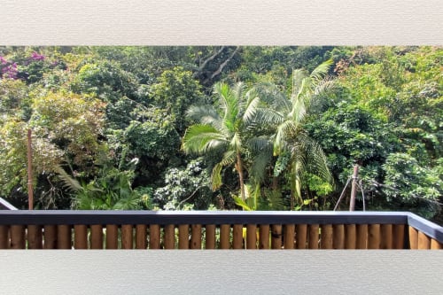 Lush tropical garden view from rooftop balcony at Joubarbe Résidence, Moka Mauritius