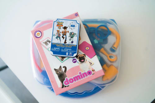 Children's toys and puzzles including Toy Story and domino sets at Résidence des Sables Mably