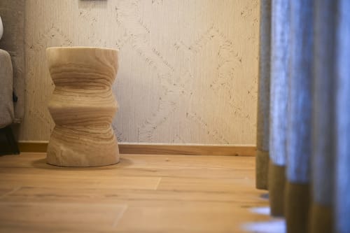 Wooden sculptural stool in Levante apartment at Vimini Apulian Experience, Bari