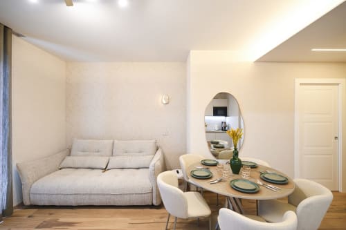 Modern Levante apartment at Vimini Apulian Experience in Bari with elegant dining area and comfortable seating