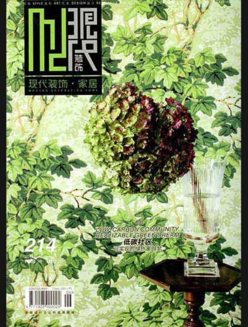 Modern magazine cover featuring floral arrangement in vase with green foliage background for Alemanys 5 boutique hotel