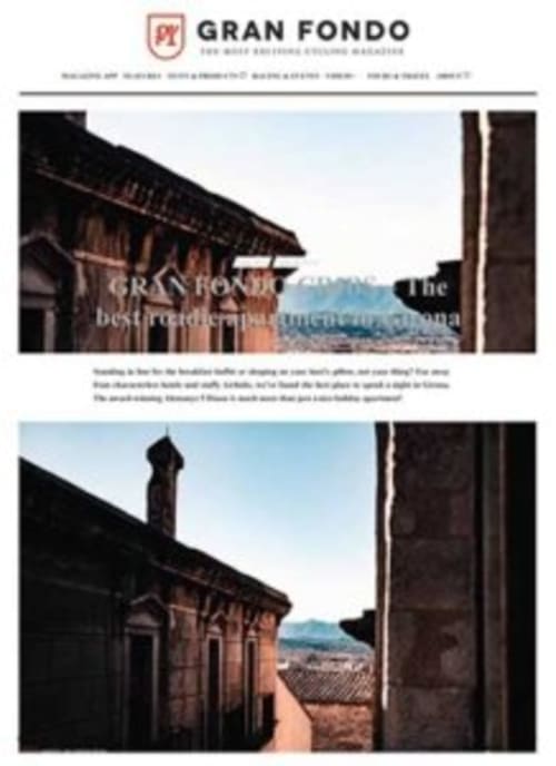 Alemanys 5 BnB in Spain: rustic stone building with tile roof and mountain views through arched doorway