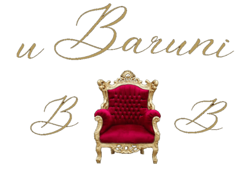 Poltrona barocca in velluto rosso con cornice dorata, lussuoso bed & breakfast U Baruni a Messina