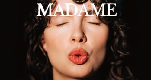 Woman with wavy dark hair and red lips, Madame text overlay, Unico Studios Milano hotel branding