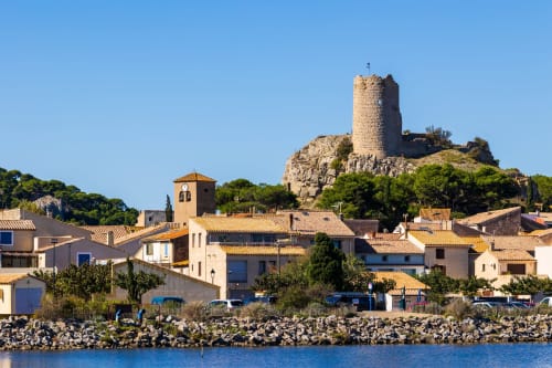 Medieval tower overlooking coastal village of Fontcouverte, France - Domaine Le Piboul B&B