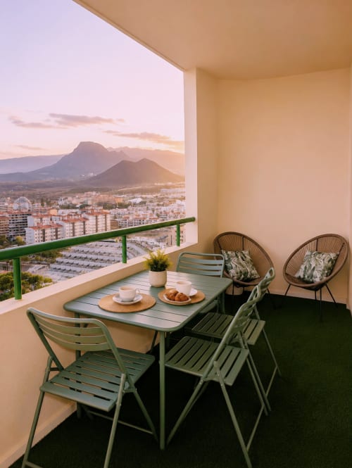 Balcony dining area at Manage Home Tenerife with mountain views, Los Cristianos