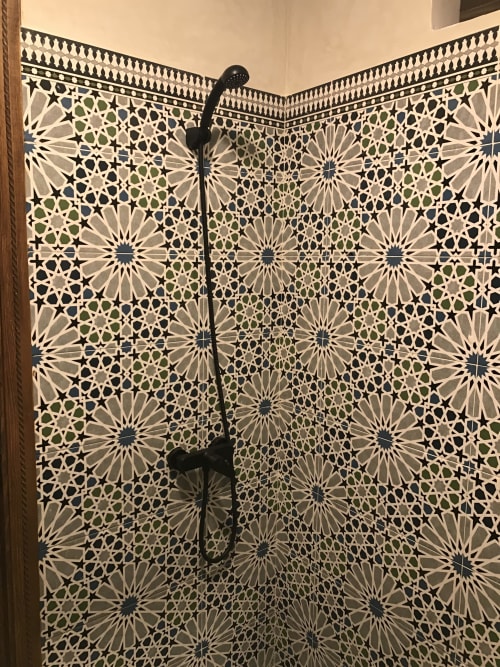 Luxury shower with intricate geometric tilework in Tassila apartment at Imsouane Surf Paradise hotel, Agadir, Morocco