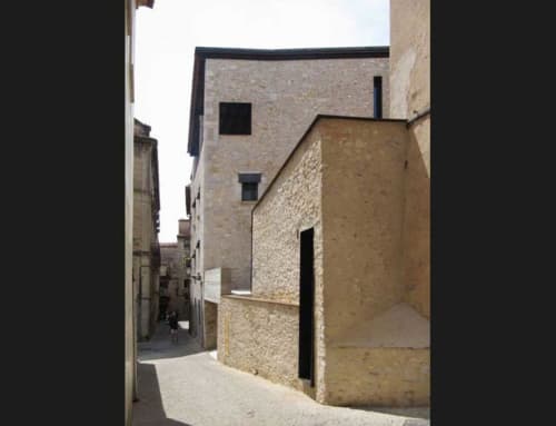 Stone cottage entrance in medieval Girona alley at Alemanys 5 bed and breakfast