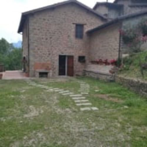 Casa in pietra rustica toscana con giardino privato presso l'Antico Belvedere B&B