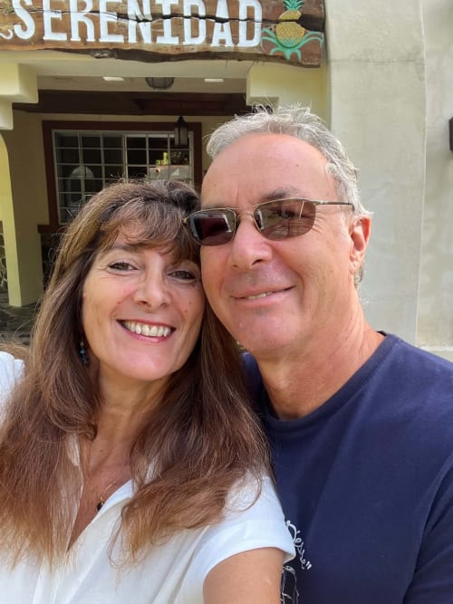 Happy couple smiling at El Litoral Panama beachfront resort in Costa Esmeralda
