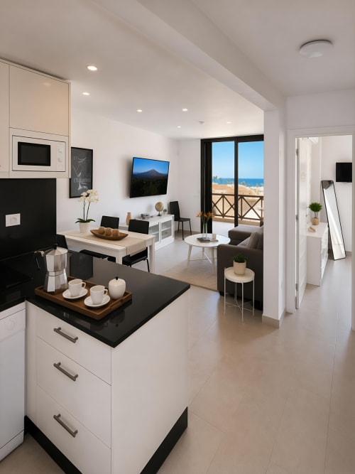 Luxury penthouse kitchen and living area with sea view in Playa de las Américas, Tenerife