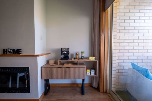 Modern kitchenette with coffee machine and storage in EcoHost FamilyHub apartment, Porto