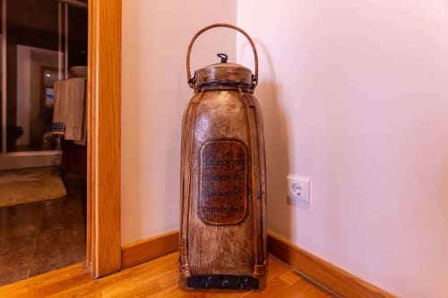 Vintage wooden lantern with handle displayed in EcoHost apartment hallway, Matosinhos