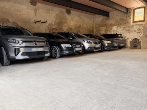 Secure private garage at Le Palmier in Aigues-Mortes with several parked vehicles