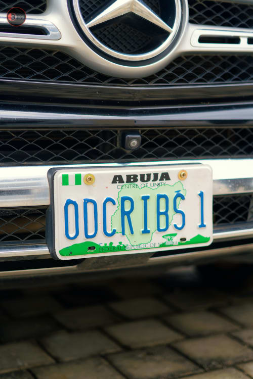 Mercedes-Benz front grille with Nigerian Abuja license plate ODCRIBS1 from OD Cribs hotel