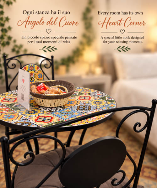 Cantinho Coração aconchegante no B&B I Mori Catania com mesa decorativa, lanches e ambiente acolhedor