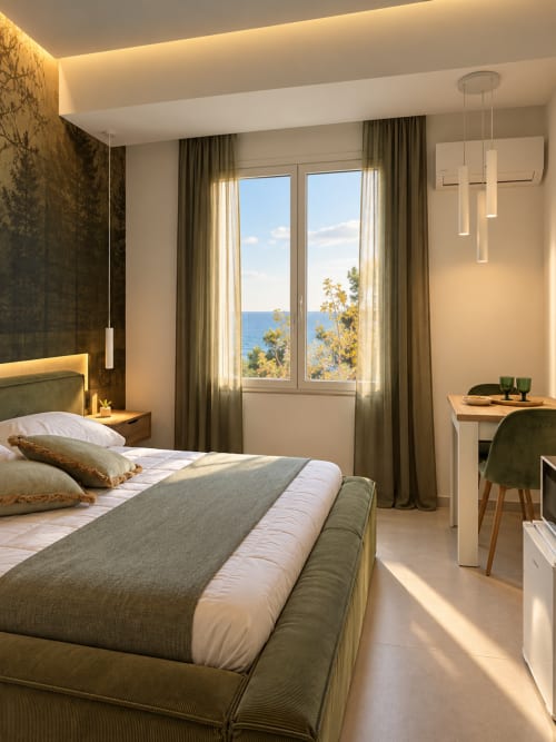Suite Giardino Segreto presso Domus Fysi, Palermo - Camera da letto moderna con vista mare, parete in marmo e design contemporaneo