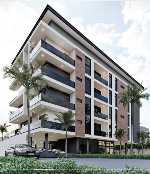 Modern apartment building OD Cribs in Wuse 2, Guzape Abuja with glass balconies and palm trees