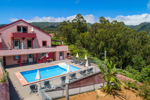 Red villa with pool overlooking mountains in Prazeres, Portugal - Garry's Holiday Rentals