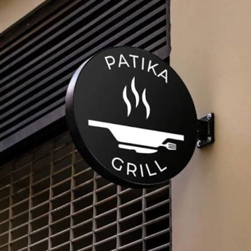 Enseigne du restaurant Patika Grill à l'Hôtel Motelia à Moissy-Cramayel, France