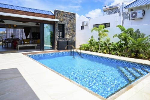 Villa Coin des Zils No. 5 à Gerards & Angel, Maurice - Villa contemporaine avec piscine cristalline et jardin tropical