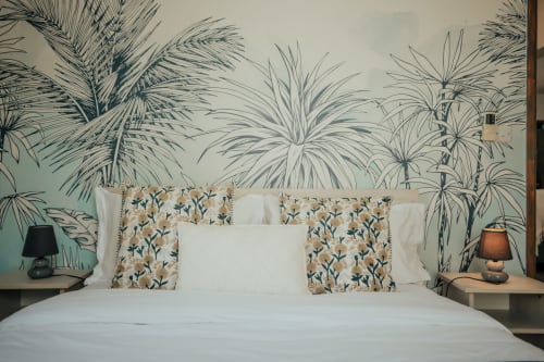 Bedroom at Summer of Hope villa in Pereybere with botanical wallpaper, white bedding, and floral pillows