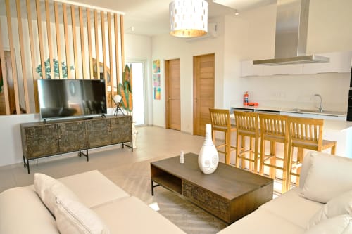 Appartement moderne ouvert à Gerards & Angel, Pointe aux Piments avec cuisine, salle à manger, salon et vue sur mer