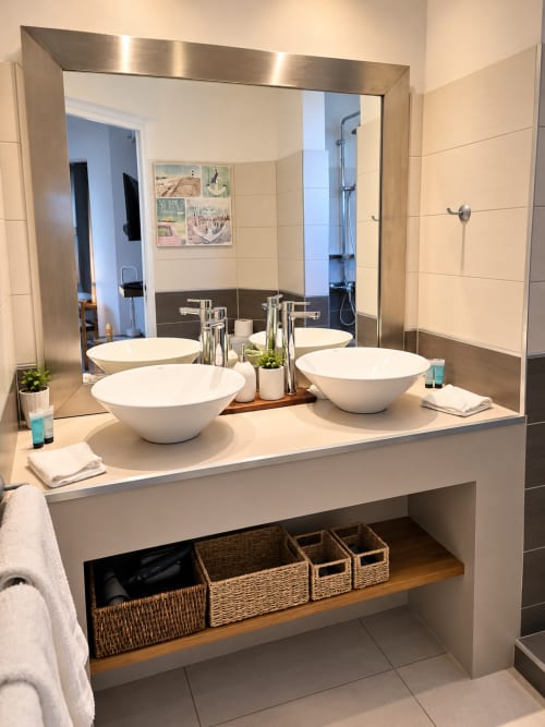 Modern bathroom vanity with dual vessel sinks at Les Balcons D'oyster Pond bungalow in Saint-Martin
