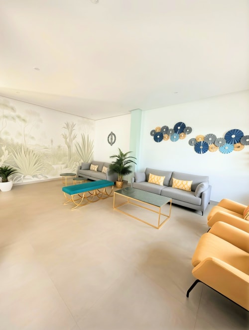 Modern living room in Manage Home Tenerife apartment, Costa Adeje, with gray sofa, yellow accents, and sea view terrace