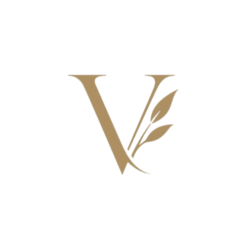 Logotipo del Boutique Hotel Velarde con elegante letra V dorada y diseño de hoja botánica