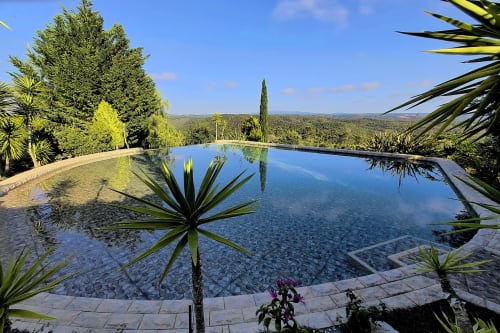 Piscina infinita com vista para a paisagem do Alentejo no hotel rural SELÃO DA EIRA, São Teotónio, Portugal