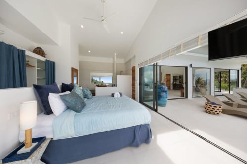 Spacious comfortable bedroom | Experience Breathtaking Sea Views at Villa Indigo
