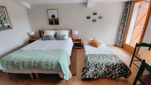 Sunflowers cottage bedroom at Les Gites de Campardon, Monties with twin beds, garden view, and modern amenities