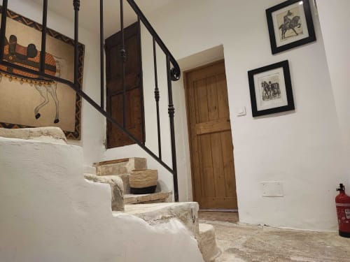 Escalier avec rampe en fer forgé à la Chambre Garance de la Magnanerie de Sainte Croix, Saint Hippolyte de Caton