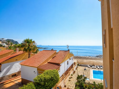 Apartamentos El Calón Playa terrace view overlooking beach and Mediterranean Sea in Cuevas del Almanzora, Spain