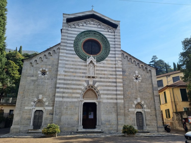 The stone inlay patterns on the Romanesque façade of Saints Nazaro and Celso Church in Bellano