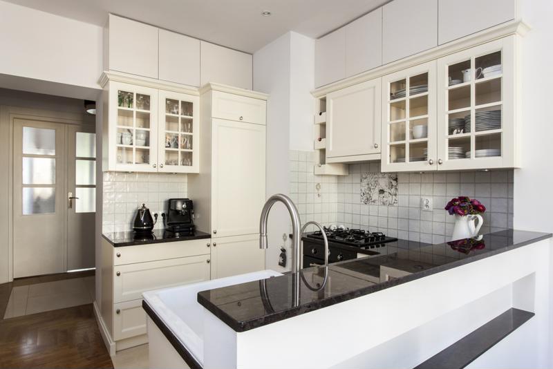 Kitchen with white cabinets.