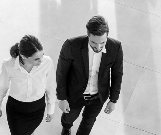 Two people in an office.