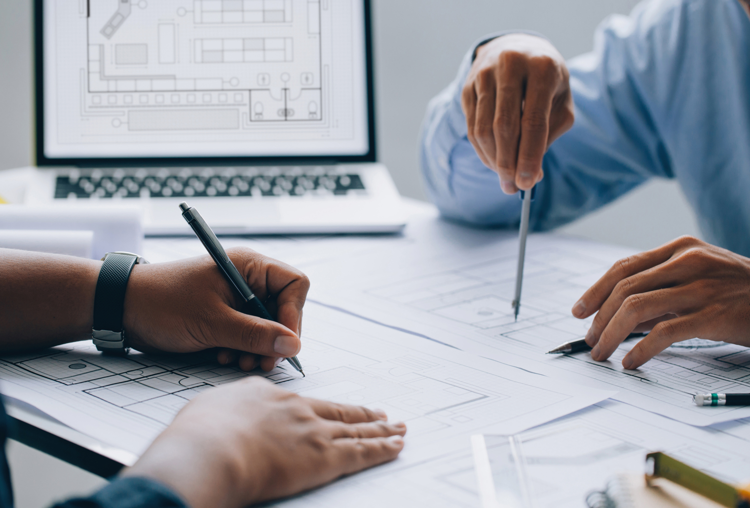 Image of two people in a meeting.