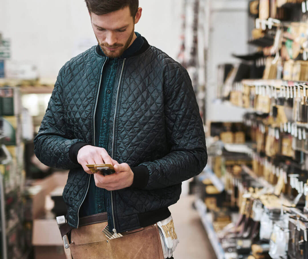 A man looking into his mobile