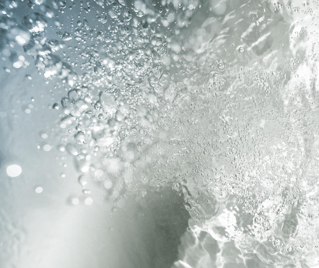 Image of water bubbles in a deep soaking tub.