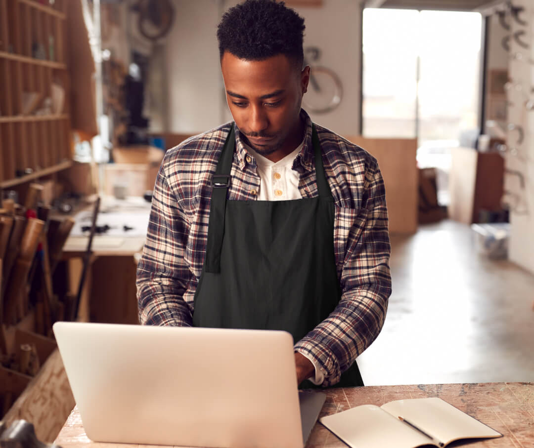 A person on a laptop.