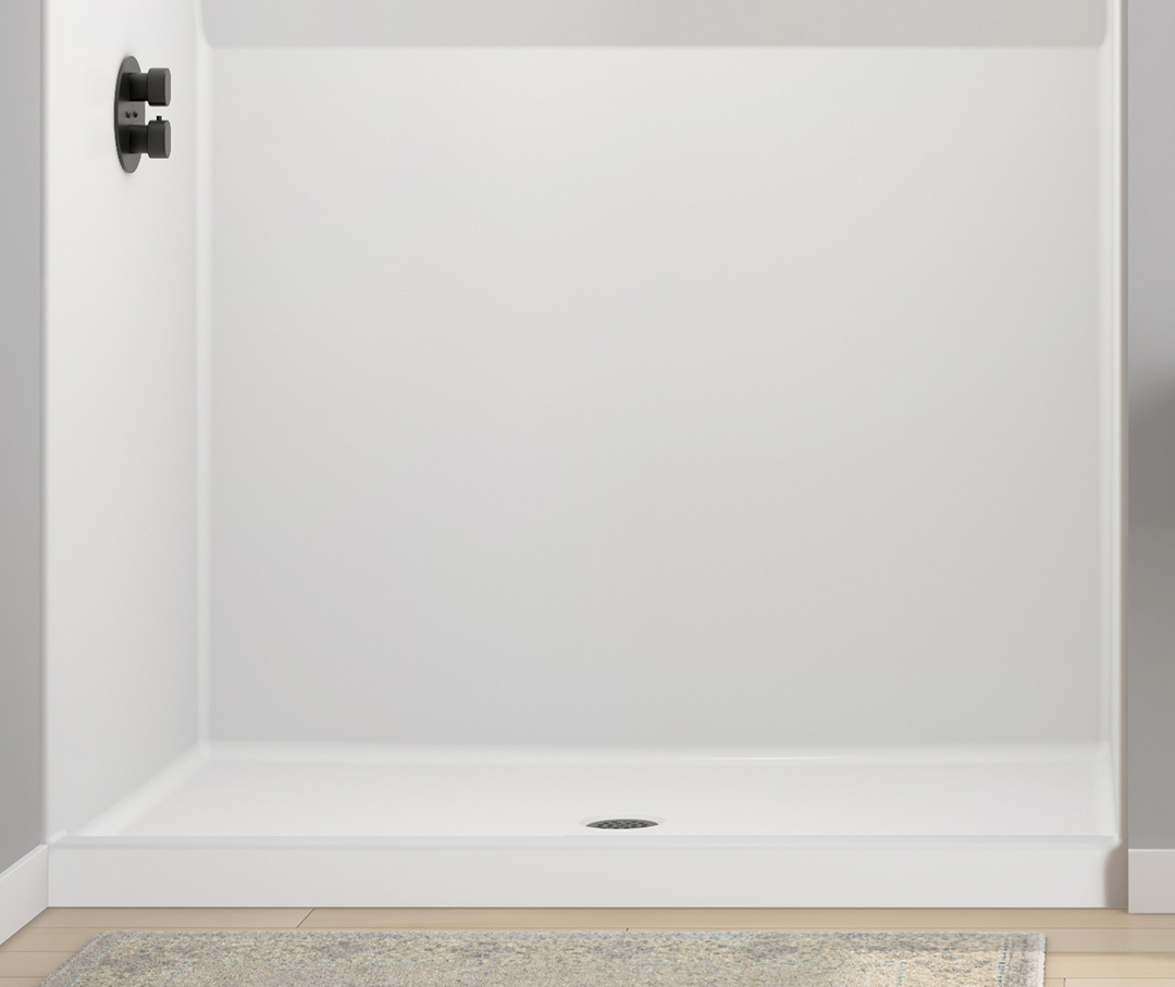 Hamilton low threshold multi-piece shower with a center drain.