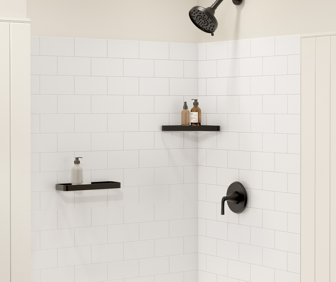 A Novaline shower with black shower accessories and shower shelves.