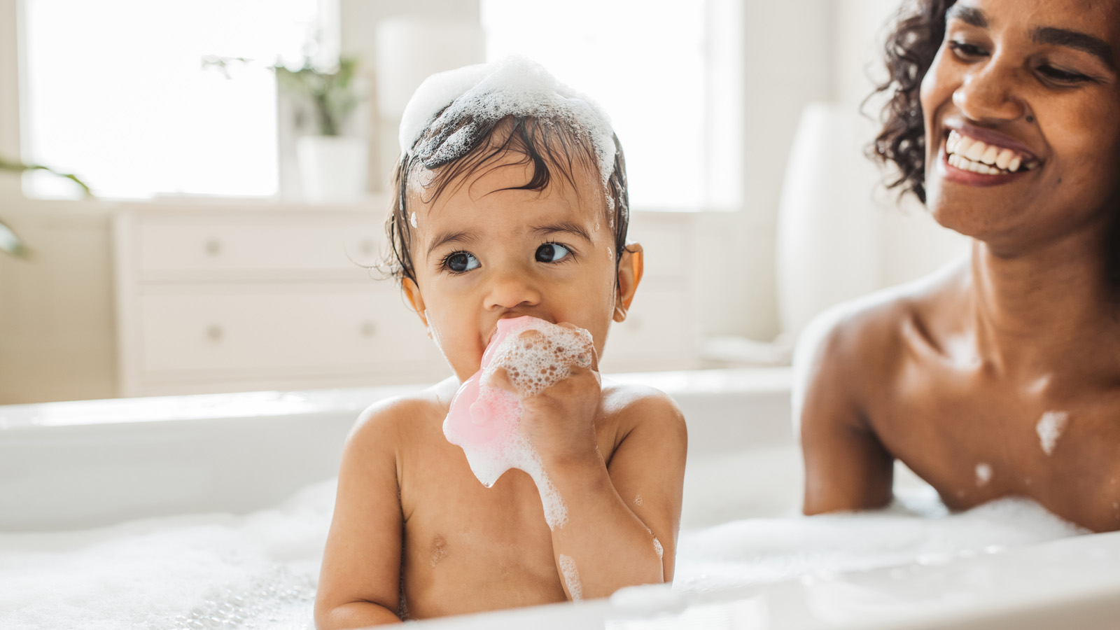 Child in MAAX Bathtub