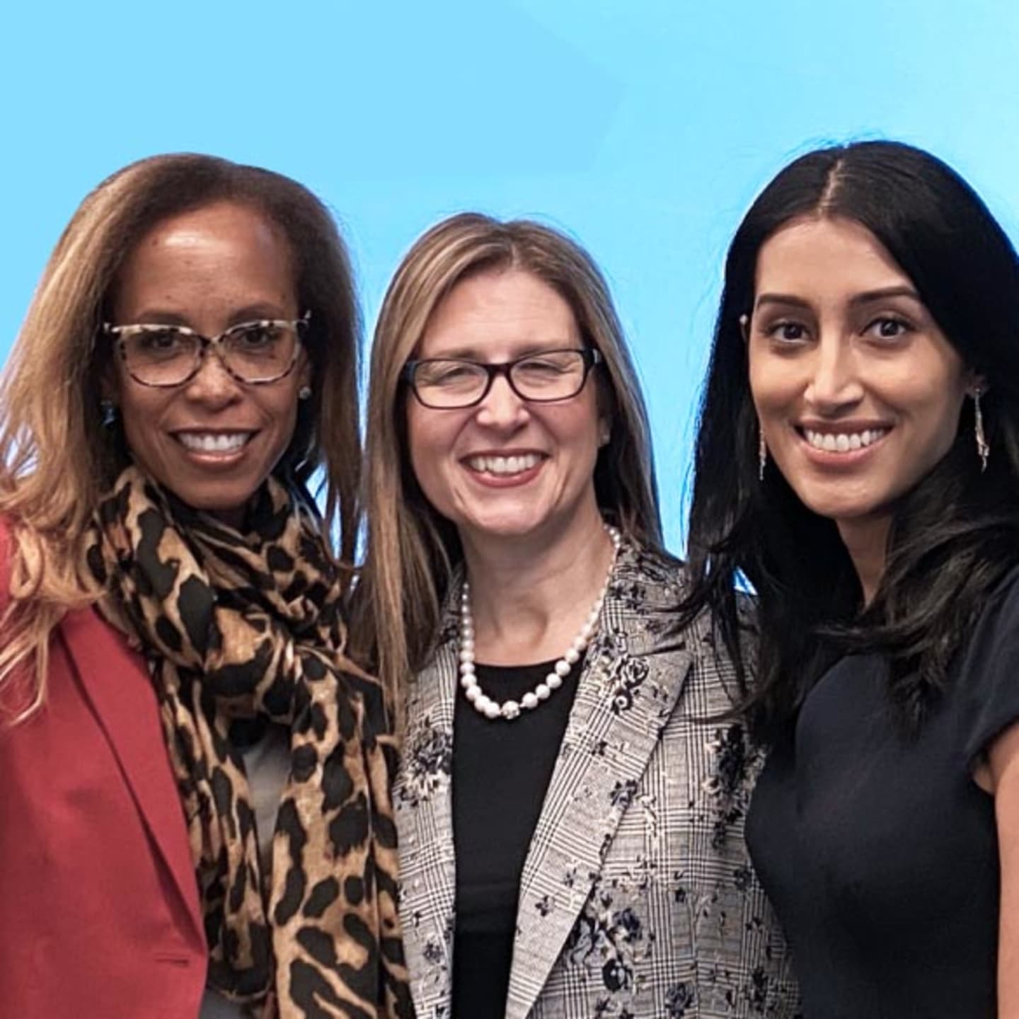 image of three women smiling together