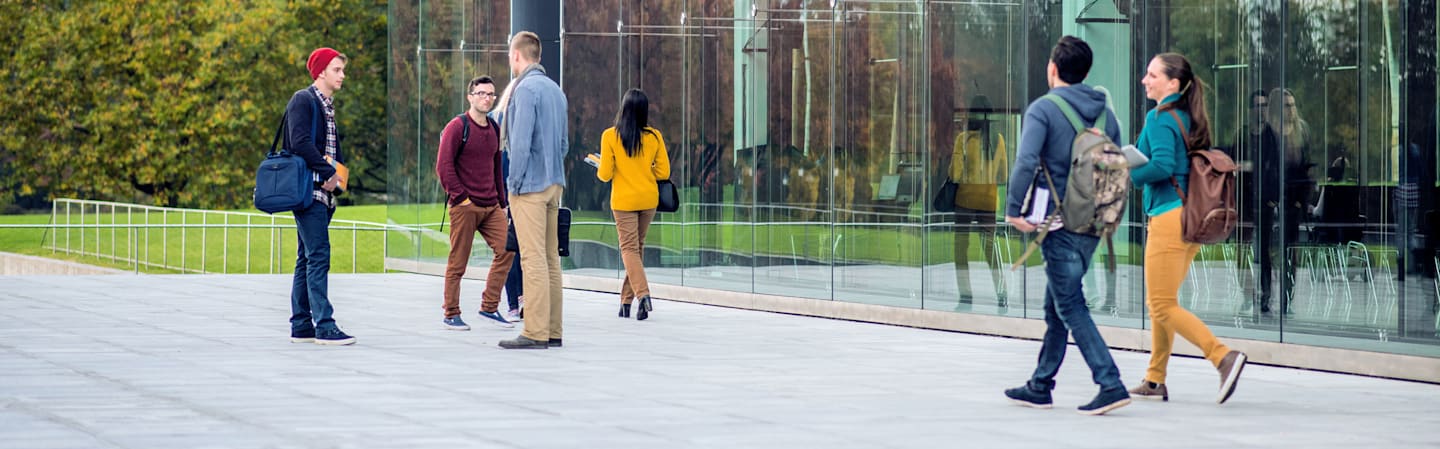 University students walking around campus.