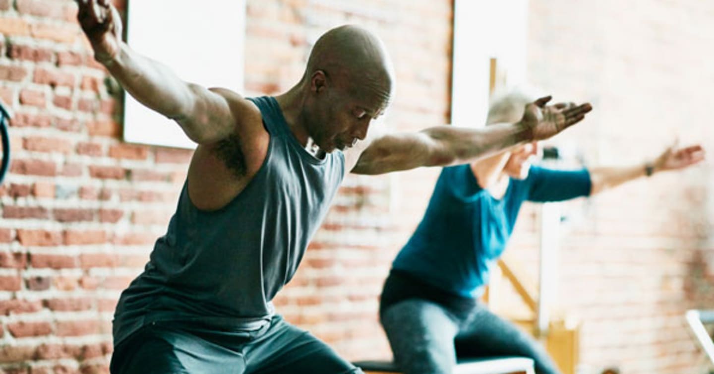 Man in yoga studio.
