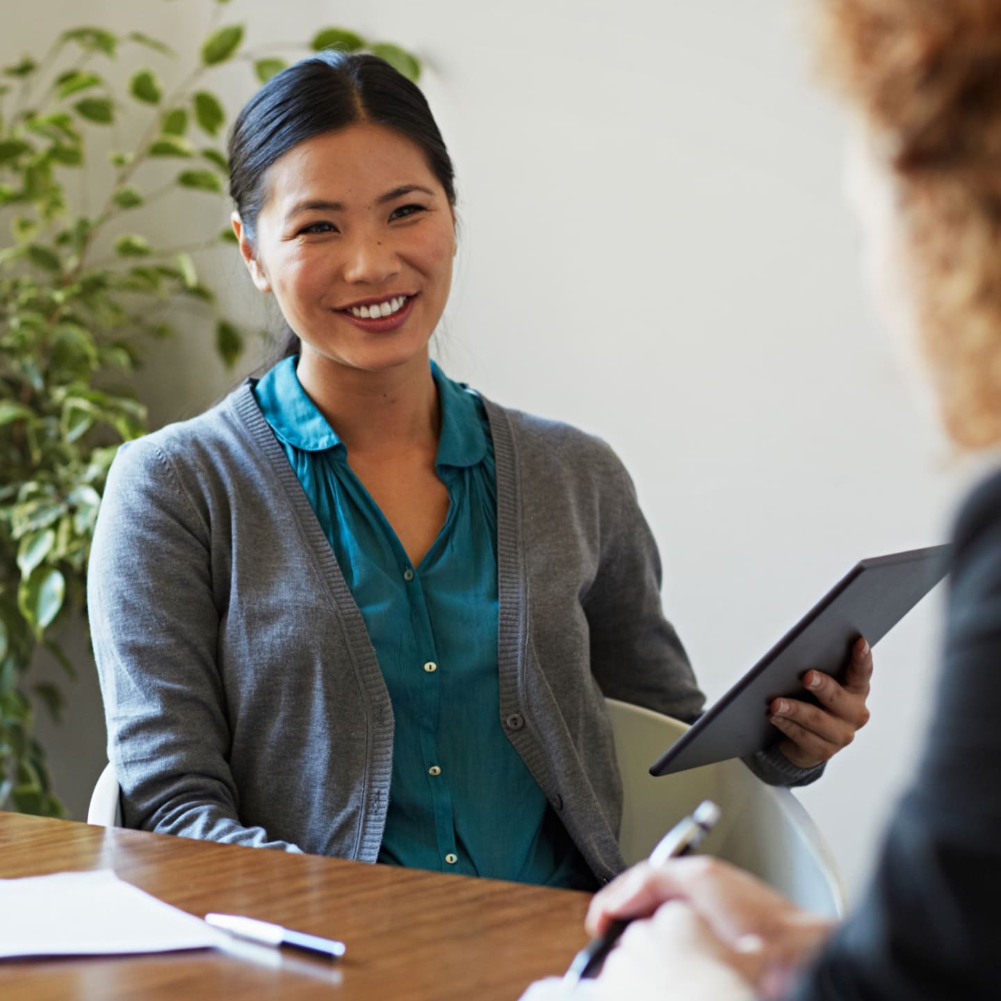 Advisor speaking with client.