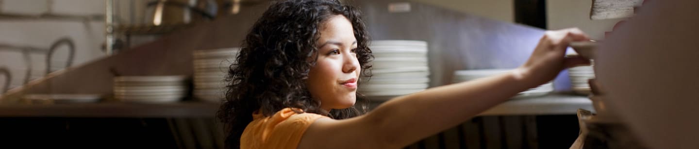 Teen working at a diner.